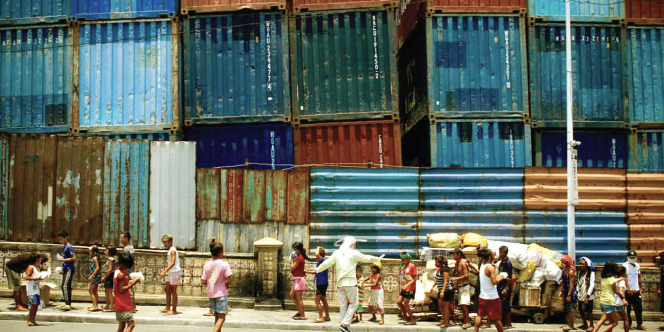 Residents of a poor district in Manila try their best to observe social distancing in this photo taken last year. (Photo: Social Watch Philippines)